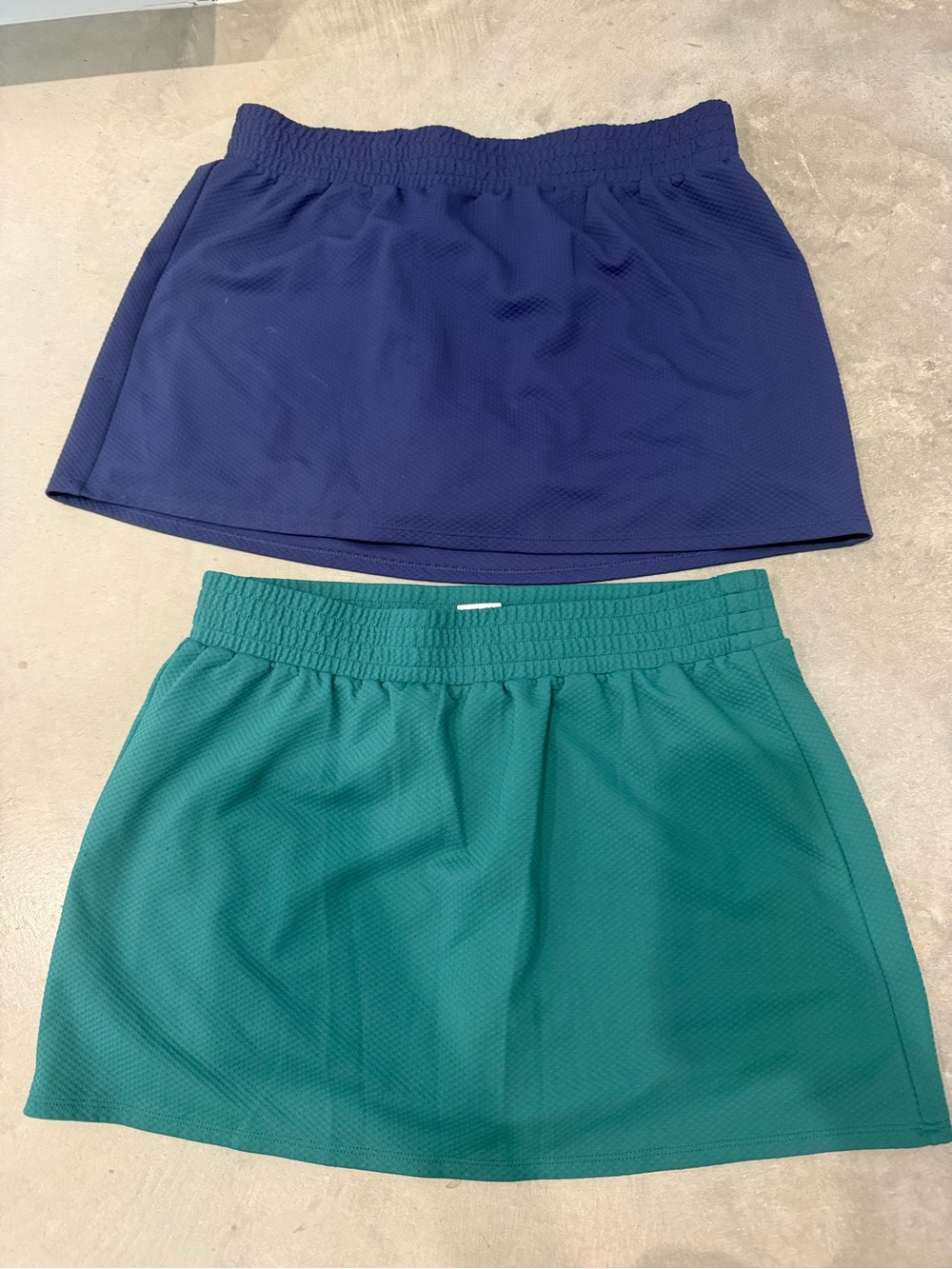 Athletic Works Women’s Two-Pack Active Skirts in Navy and Teal
